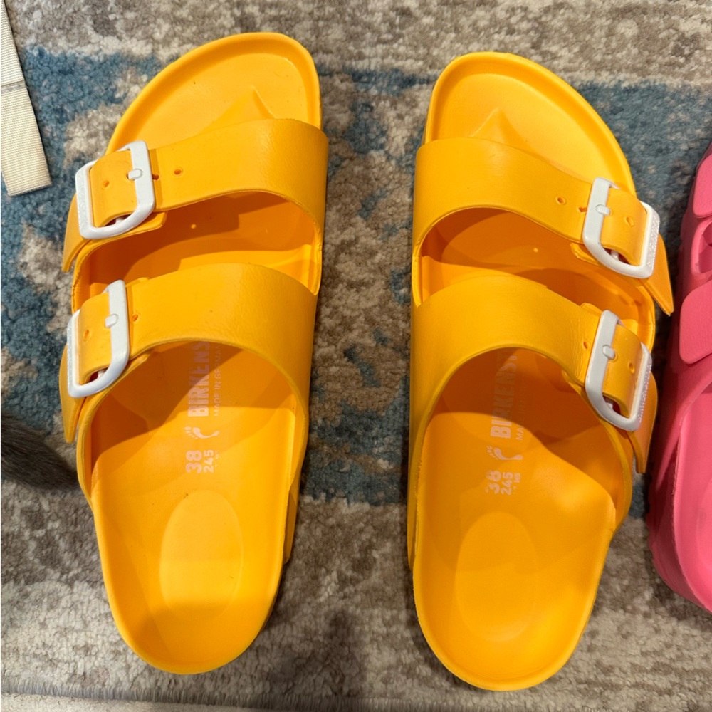Used orange Birkenstocks